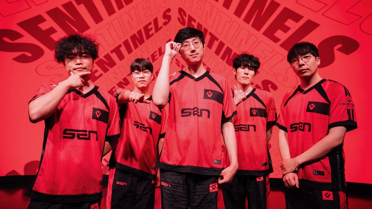 Sentinels League of Legends players pose together in red jerseys